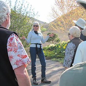A volunteer leading a tour of Red Butte Garden