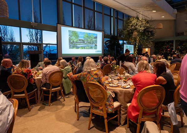 Guests at a Gala in the Red Butte Garden Orangerie.